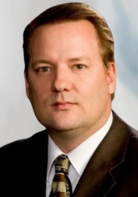 Photo of Senior Attorney Tom Nellessen from Johnson Law Group.